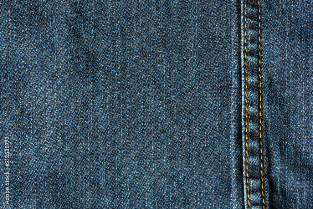 Denim jeans texture background. Texture of blue cotton fabric. Fabric structure. Denim jeans texture background. Texture of blue cotton fabric. Fabric structure.