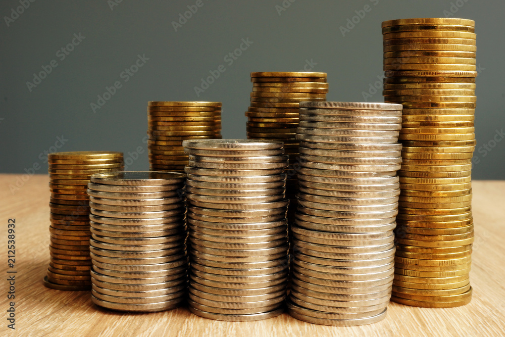 Stack of coins. Increase of wealth. Business success. Stack of coins. Increase of wealth. Business success.
