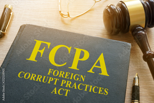 FCPA Foreign Corrupt Practices Act on a desk. photo