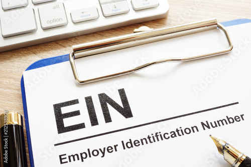 Employer Identification Number (EIN) on a clipboard. photo