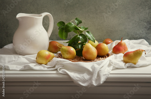 still life with fresh pears on wooden table