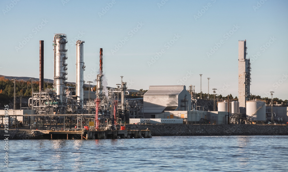 Modern oil plant, coastal industrial landscape Modern oil plant, coastal industrial landscape