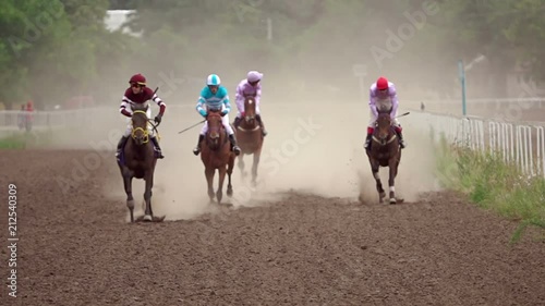 Four Riders on Horse Races. Slow Motion