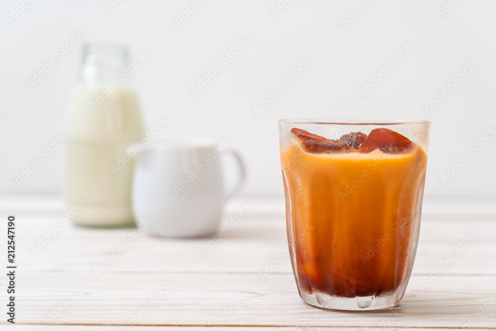 Thai tea ice cube with milk Thai tea ice cube with milk