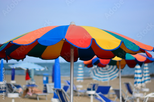Beach umbrellas of rainbow colors