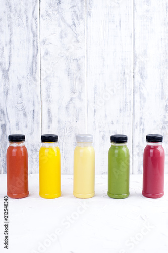 Organic cold-pressed raw vegetable juices in glass bottles. Vitamin and healthy food. Copy space.