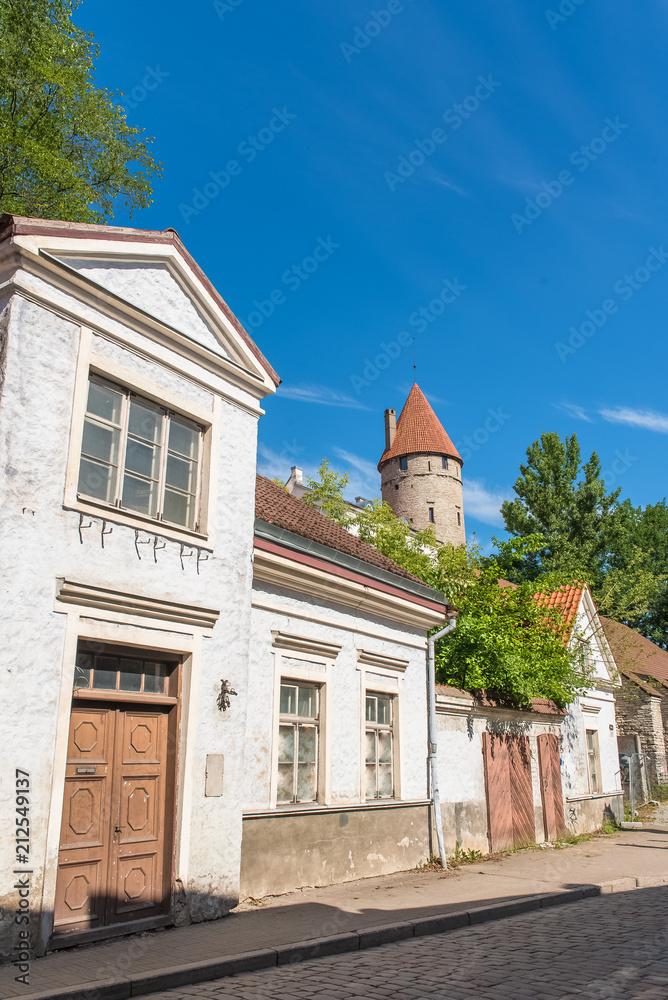 Tallinn in Estonia, old houses in the medieval city, typical tower
