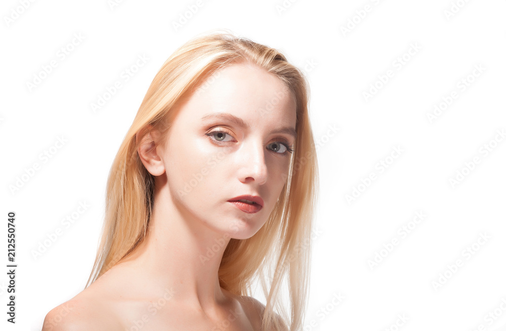 Portrait of a beautiful blonde on a white background. Portrait of a beautiful blonde on a white background.