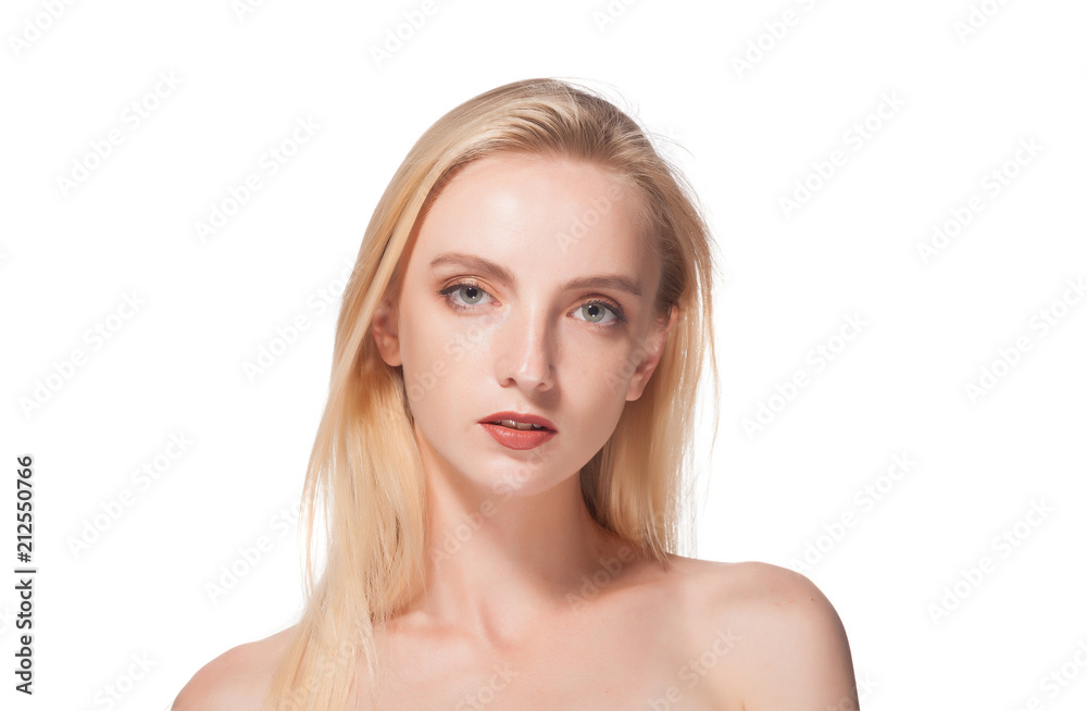 Portrait of a beautiful blonde on a white background. Portrait of a beautiful blonde on a white background.