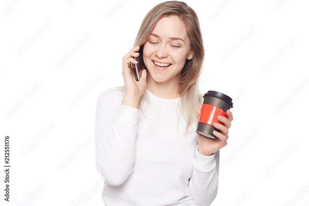 Woman enjoying spending time laughing over new memes. Portrait of beautiful creative blond haired lady in Woman enjoying spending time laughing over new memes. Portrait of beautiful creative blond haired lady in