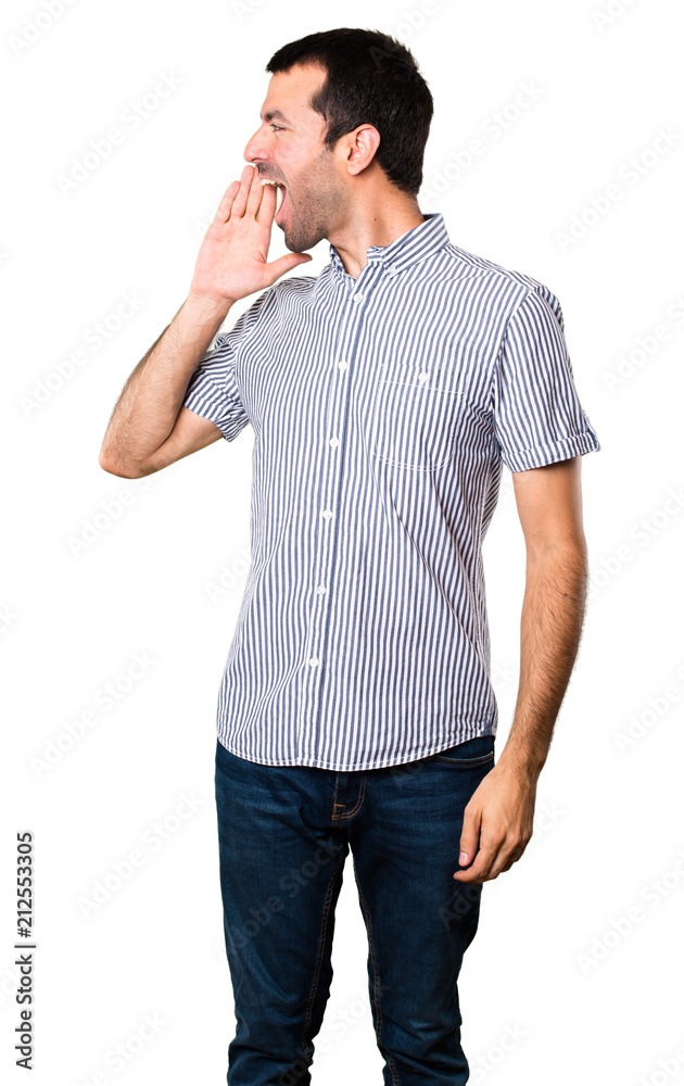 Handsome man shouting on isolated white background