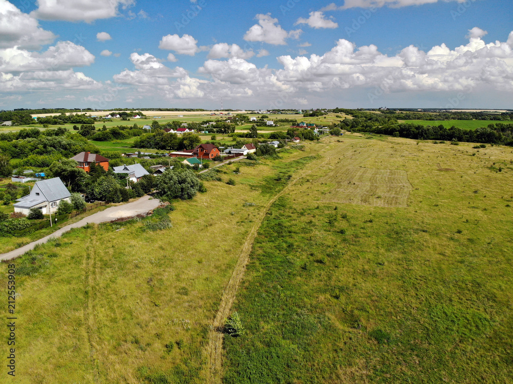 aerial photography of village in middle strip of Russia