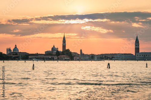 sunset over Venetian lagoon with Venice skyline in background