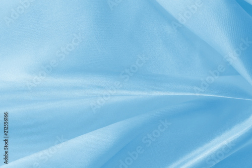 Blue fabric texture for background and design, beautiful pattern of silk or linen. © Nattha99