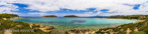 Beautiful panorama with the Mediterranean sea in Greece. crystal and colorful water, rocks, vegetation, beac © czamfir