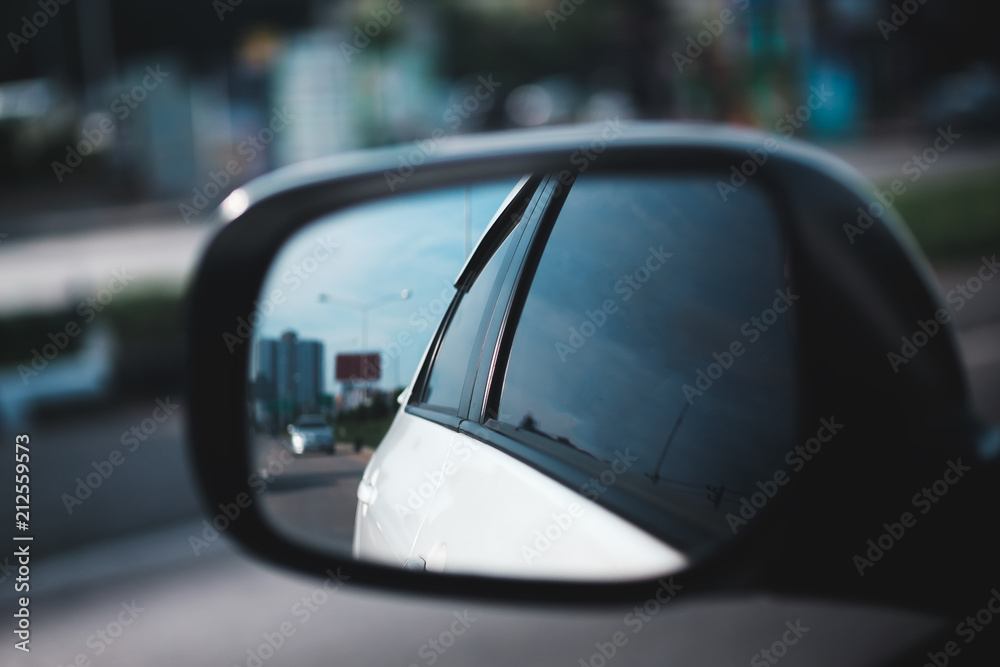 The reflection on car mirror with daylight