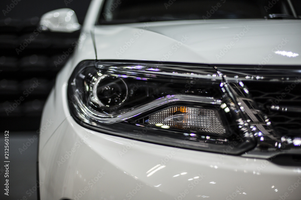 headlight of white modern car with led and xenon optics