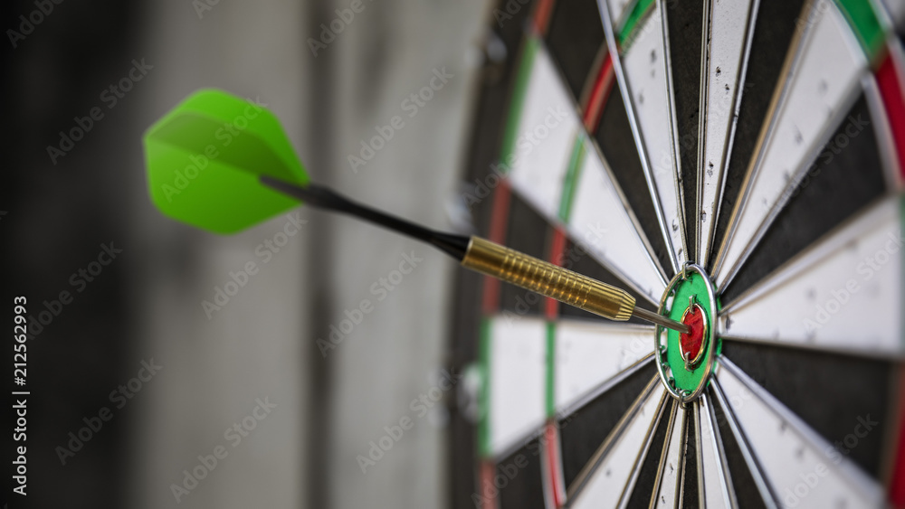 a typical darts game with dart in the bullseye Stock-Foto | Adobe Stock