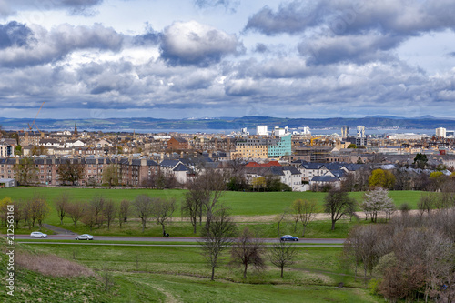 View of Edinburgh city towards coastal area of the North Sea from Arthur’s Seat, the highest point in Edinburgh located at Holyrood Park, Scotland, UK