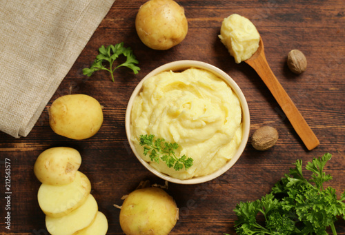 Vászonkép fresh organic mashed potatoes on a wooden table