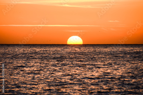 The  Sun Setting in the Sea
