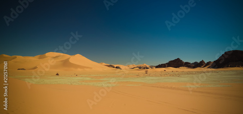 Landscape of sand dune and sandstone nature sculpture at Tamezguida in Tassili nAjjer national park  Algeria