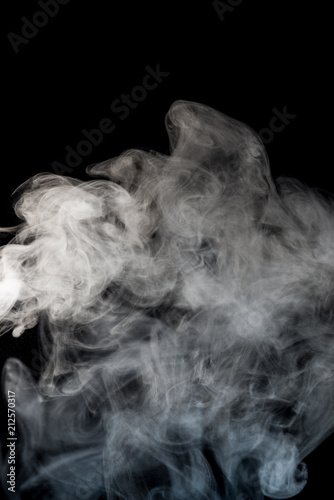 White smoke isolated on black background.