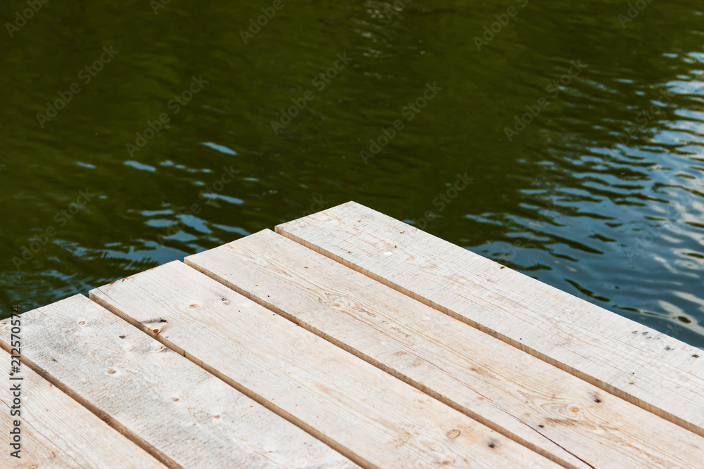 wooden planks on the background of water wooden planks on the background of water