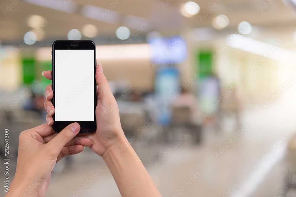 Cropped shot view of woman's hands holding smart phone Cropped shot view of woman's hands holding smart phone