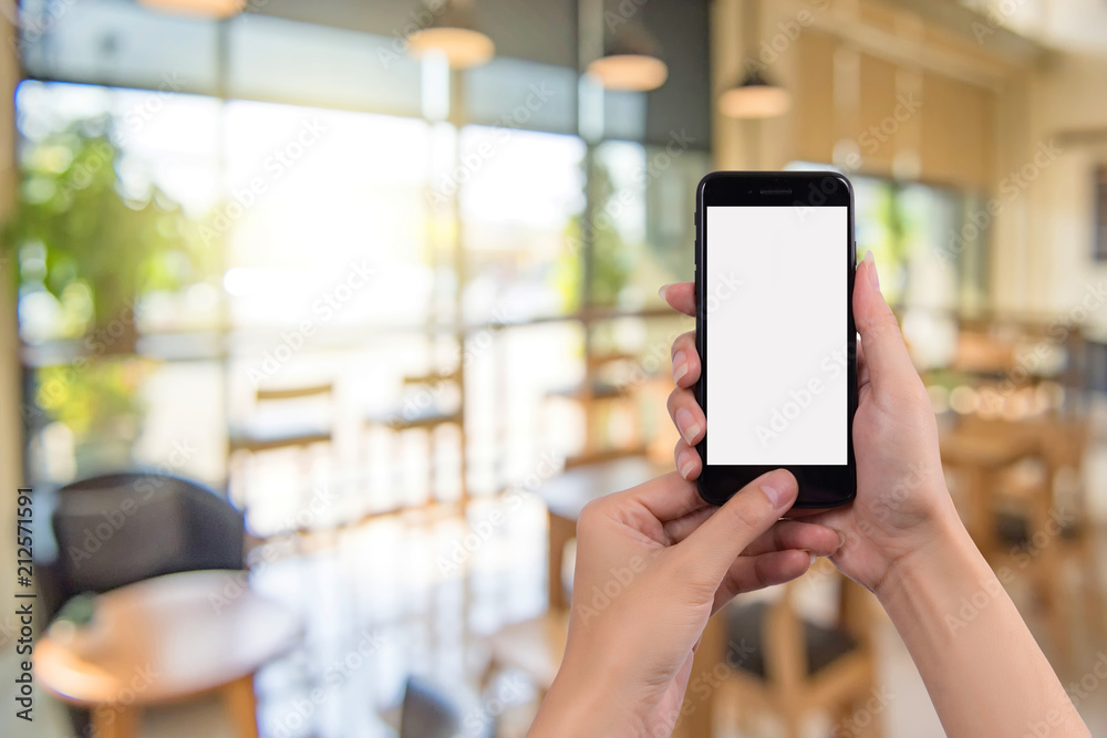 Cropped shot view of woman's hands holding smart phone