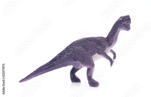 toy small dinosaur isolated on white background photo