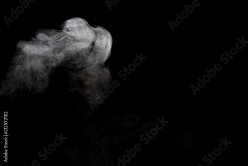 White smoke isolated on black background.