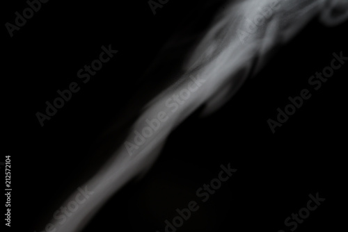 White smoke isolated on black background.