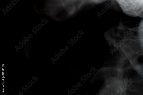 White smoke isolated on black background.
