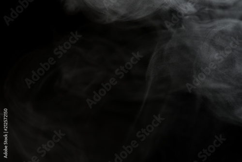 White smoke isolated on black background.