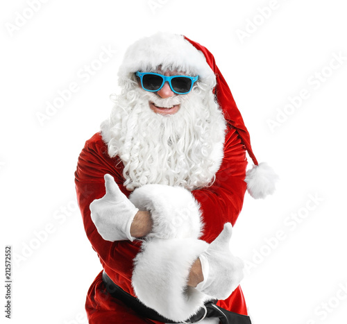 Authentic Santa Claus wearing sunglasses on white background