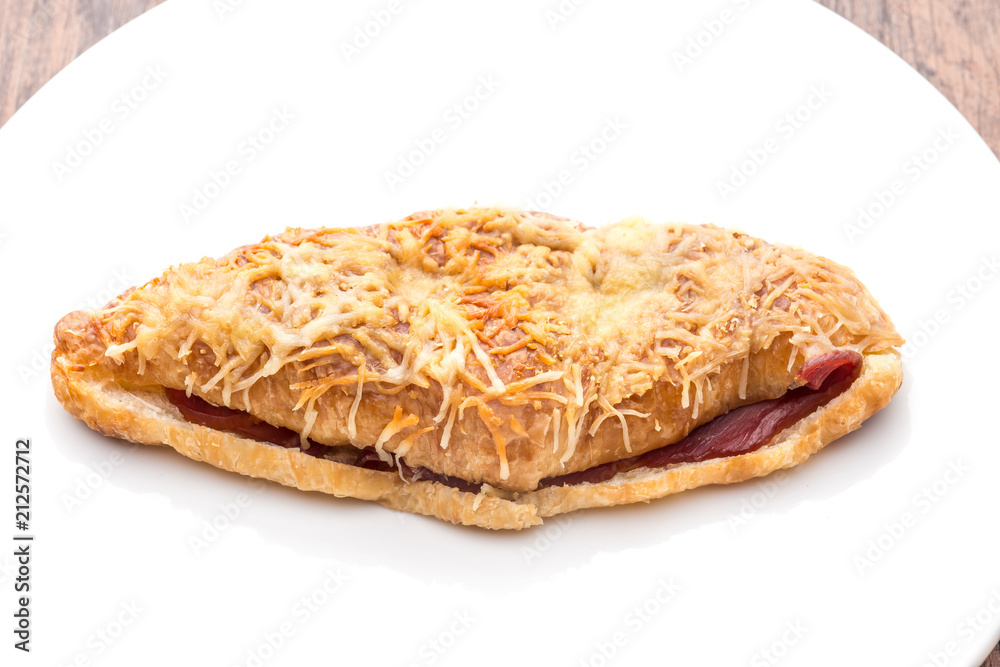croissant ham cheese on white plate croissant ham cheese on white plate