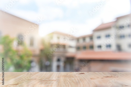 top wood table with Blur Background