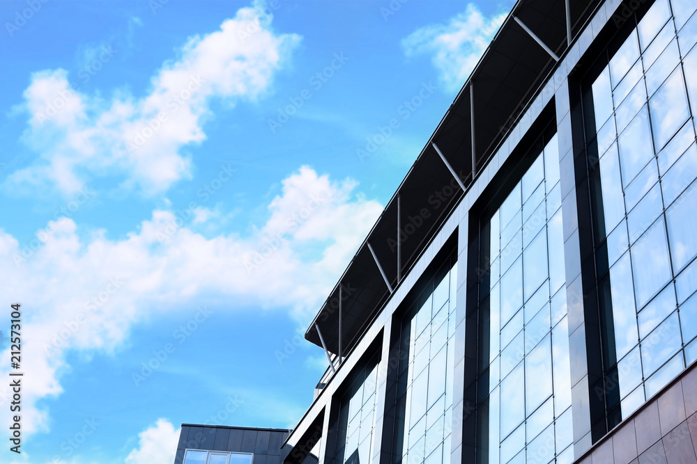 Building with tinted windows, outdoors. Modern architectural design Building with tinted windows, outdoors. Modern architectural design
