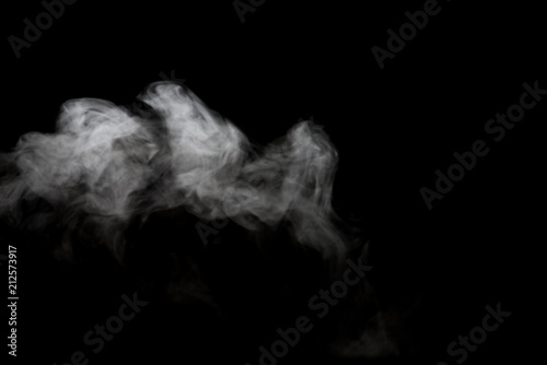 White smoke isolated on black background. © joesayhello