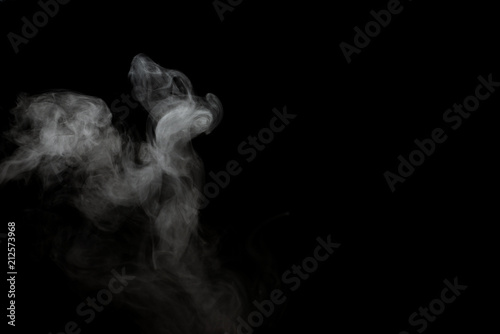 White smoke isolated on black background.