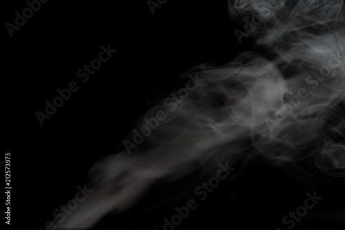 White smoke isolated on black background.