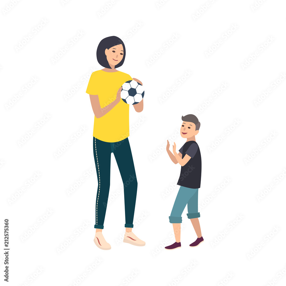 Mom and son playing football or soccer Mom and son playing football or soccer