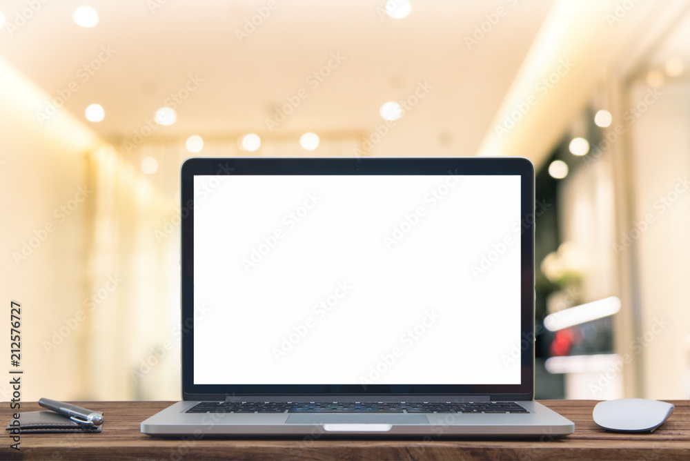 Computer notebook and mouse with a coffee shop Computer notebook and mouse with a coffee shop