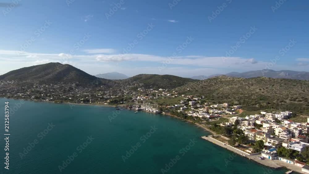 Aerial shot over Salamina island in Greece. View of the island city and port. Location near Athens. Aerial shot over Salamina island in Greece. View of the island city and port. Location near Athens.