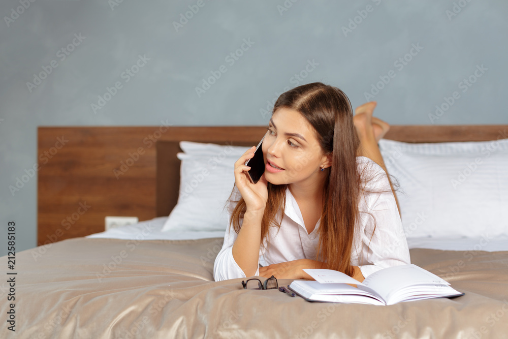 woman working on a business trip at the hotel woman working on a business trip at the hotel