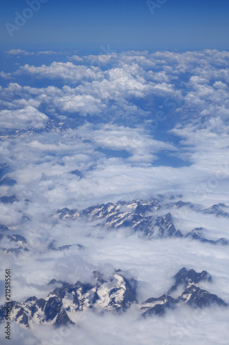 flight above the clouds, Alps Mountains