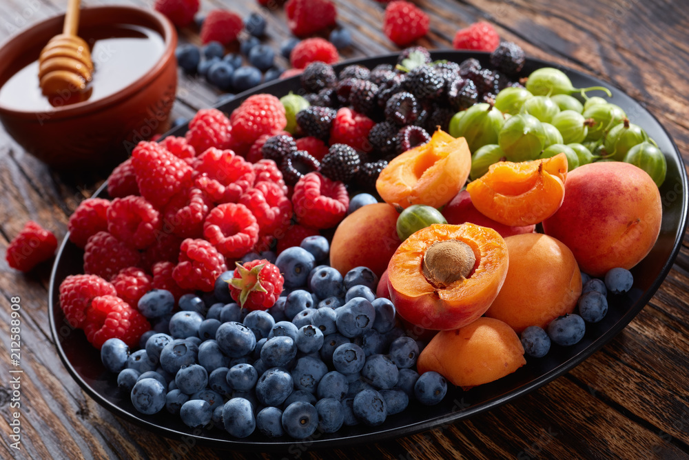 Fruit and berries platter, top view Fruit and berries platter, top view