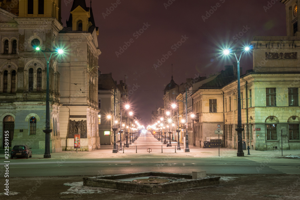 Fototapeta premium Piotrkowska street at night in Lodz city, Lodzkie, Poland
