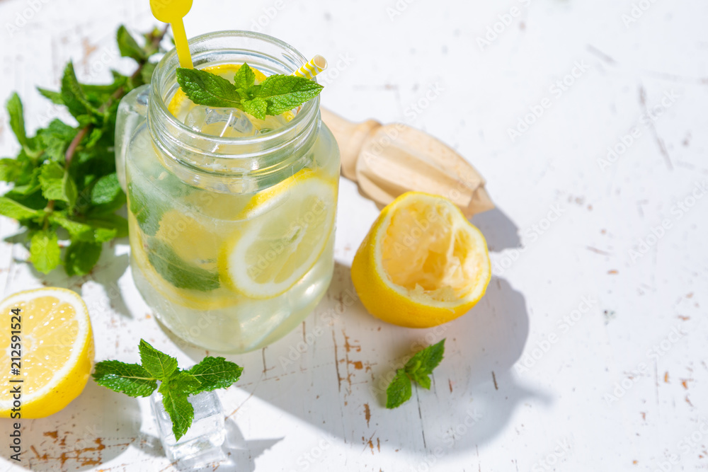 Summer lemonade on wood background